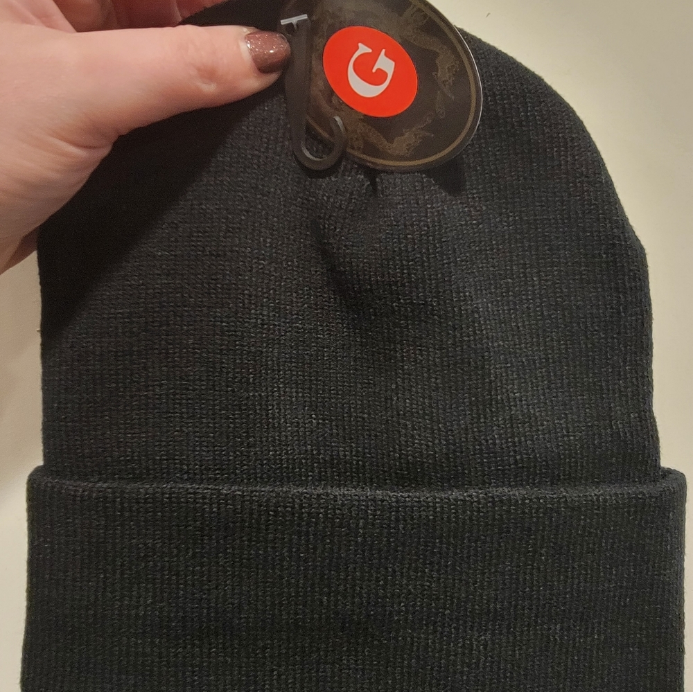 Three beanies,Two Solid Color Beanies w/tags and one loot gaming beanie.